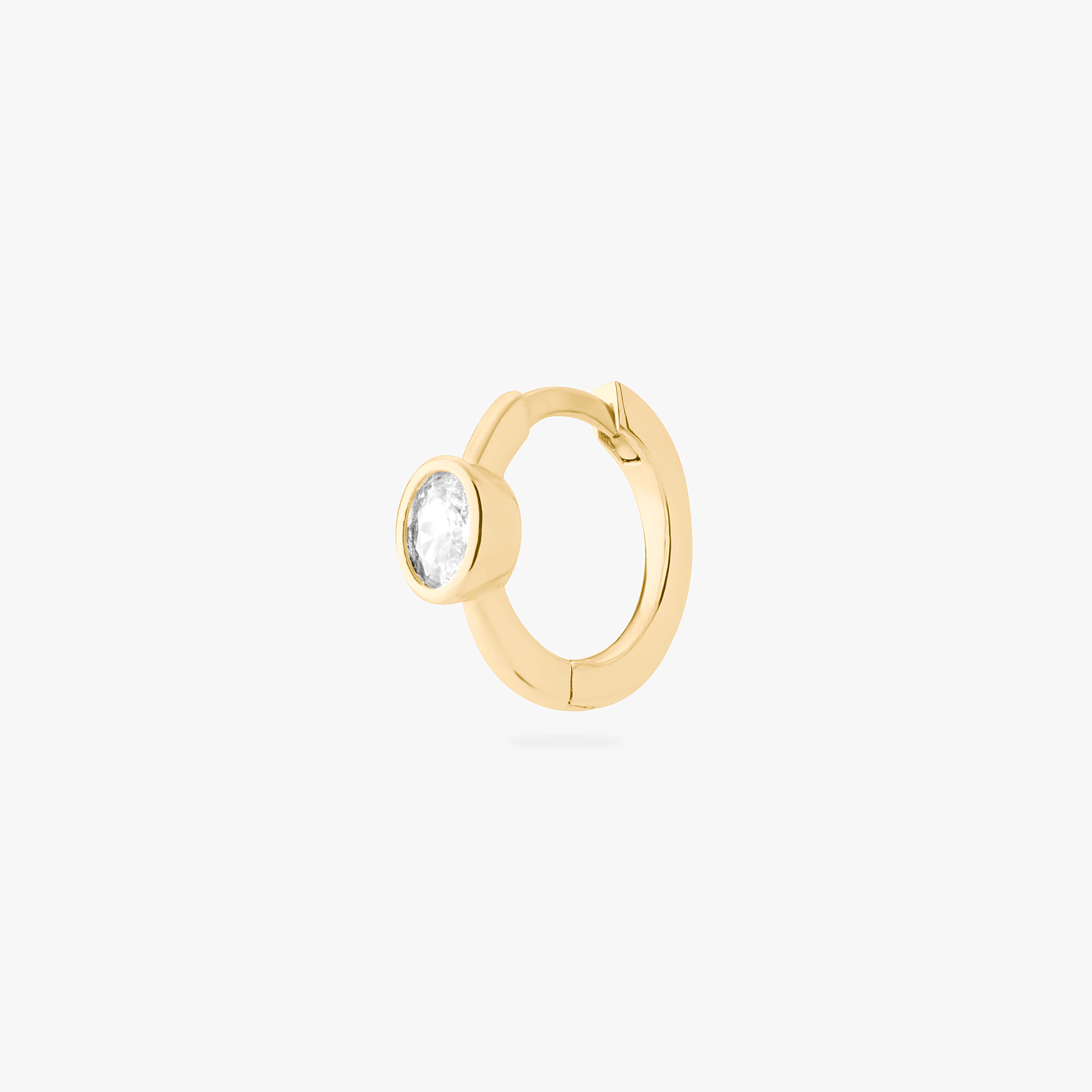 434-oval-bezel-huggie-1.webp Oval Bezel Huggie