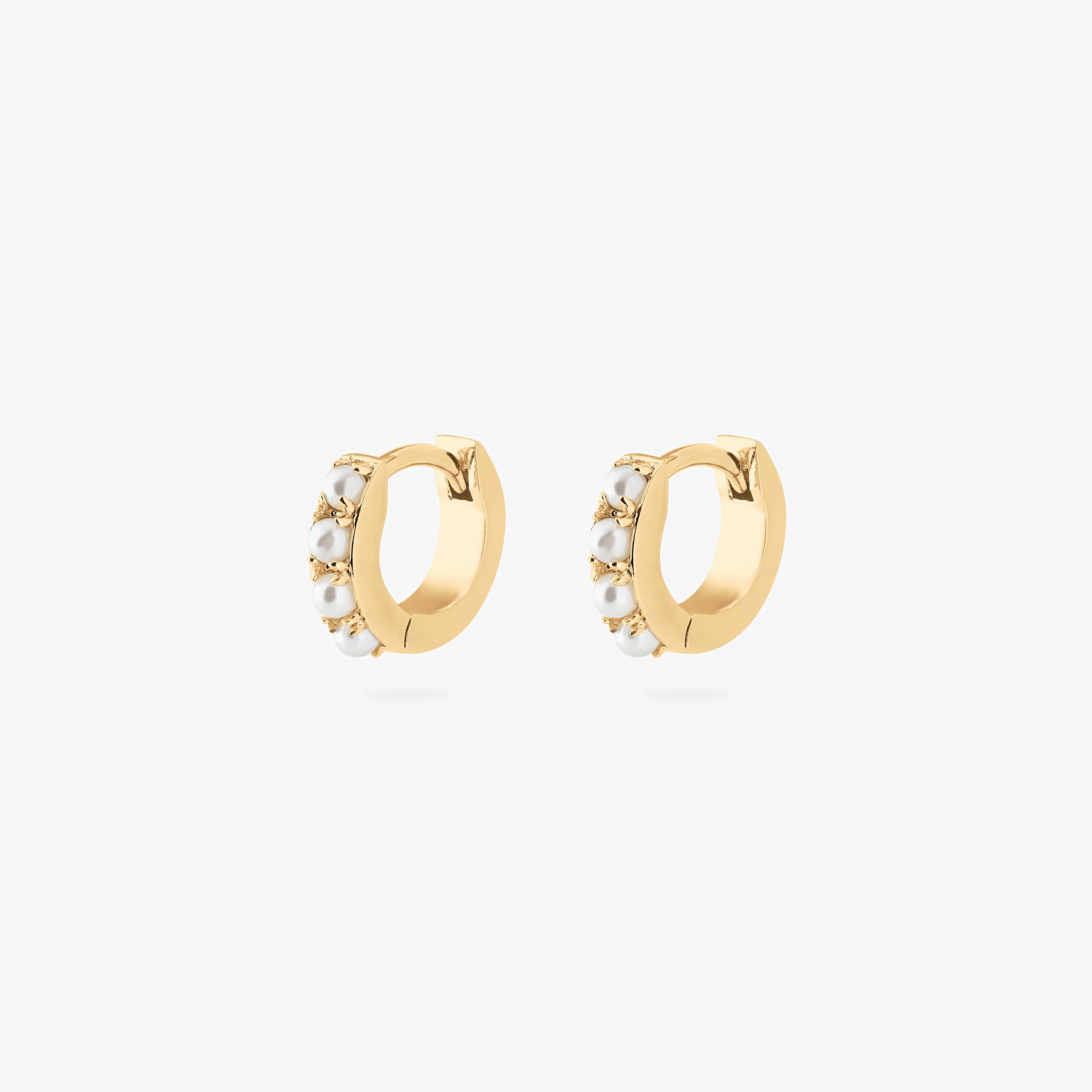 546-micro-pearl-huggie-4.webp Micro Pearl Huggie